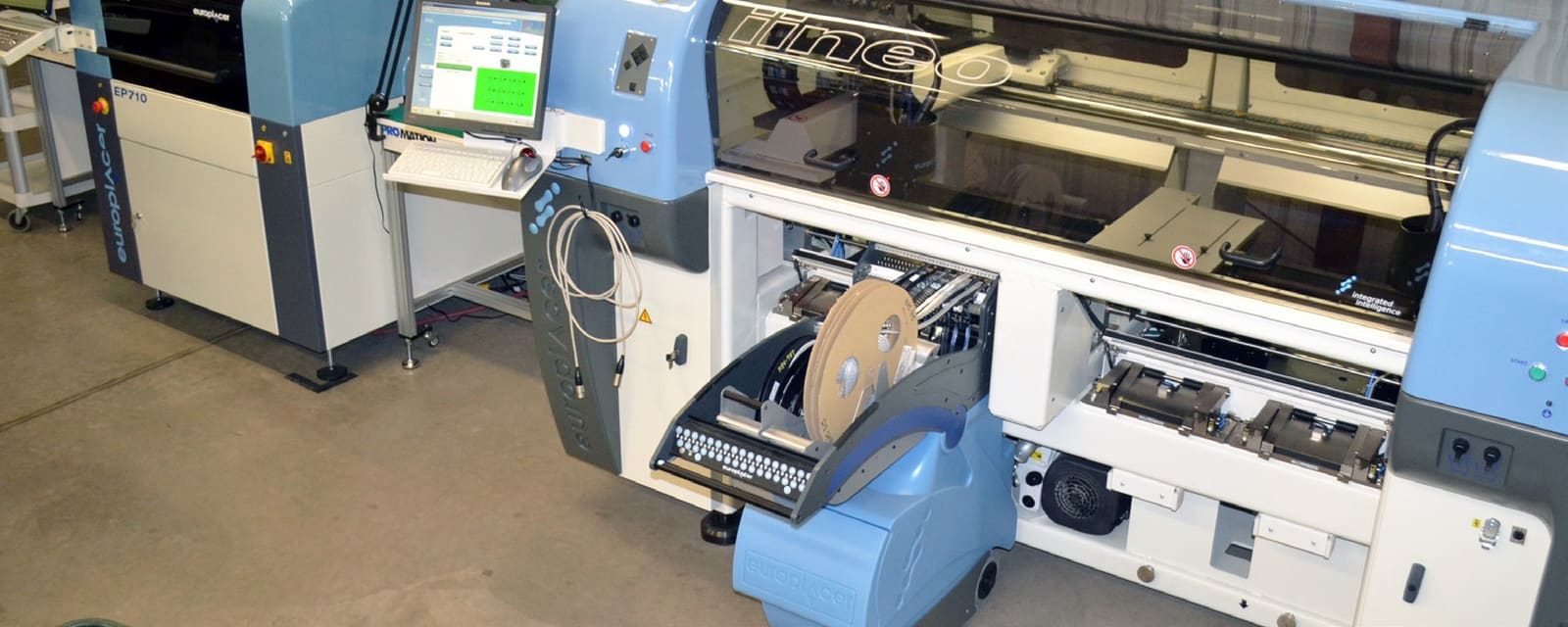 Surface mount line at GC Controls: solder paste printer and pick-and-place machine